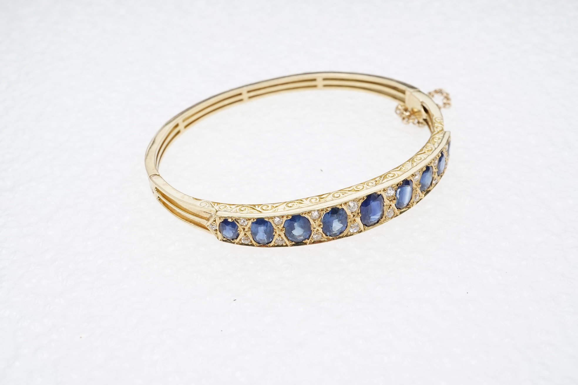 A sapphire and diamond bangle